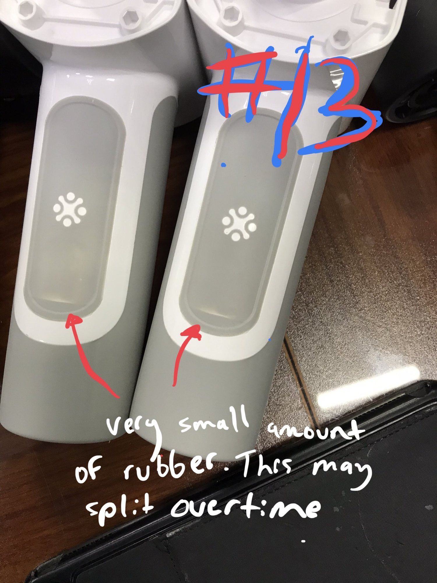 Two grey Vertigun handles, with a note drawn on the photo that a thin rubber section may split over time.